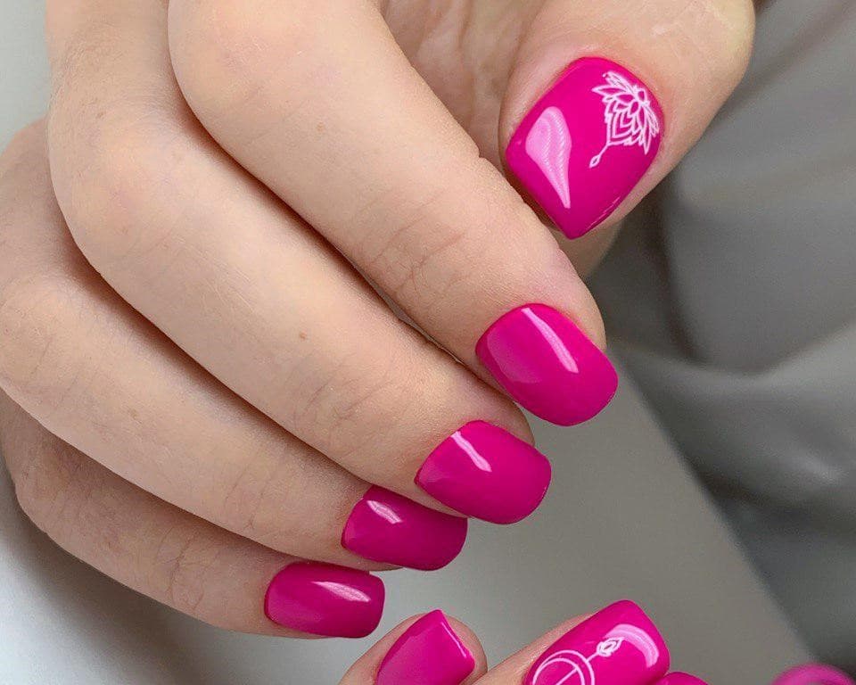 Modern nail studio with technician providing manicure service